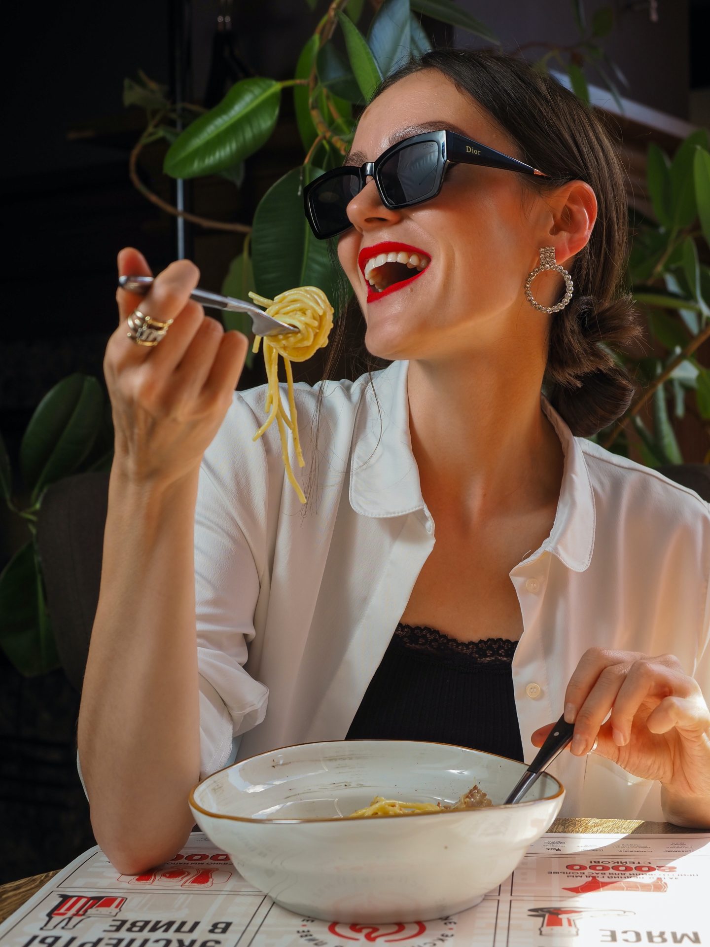 A woman enjoying the pasta